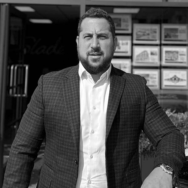 Slades Estate Agents - Lettings Office - Jason Jacobs - Jacket B&W